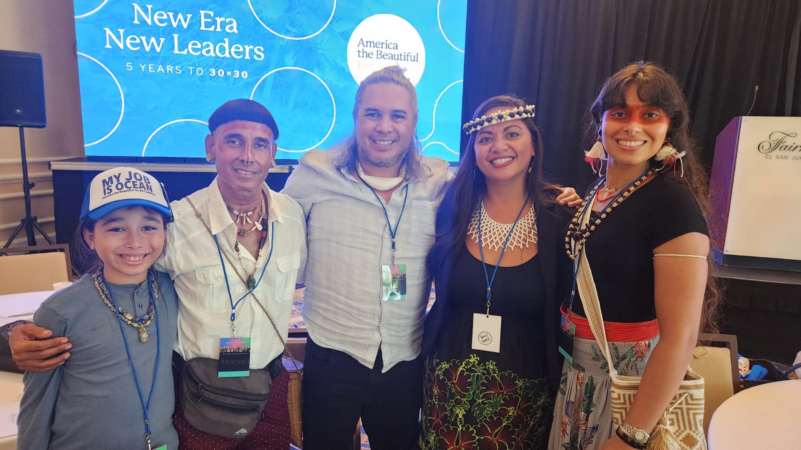 natives from puerto rico and mariana islands pose for a photo